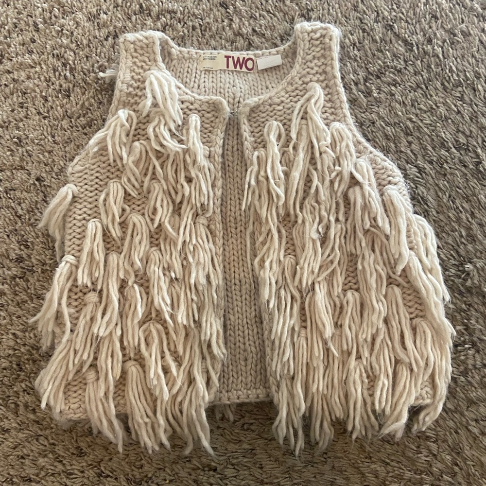 Toddler girl’s knitted fringe vest